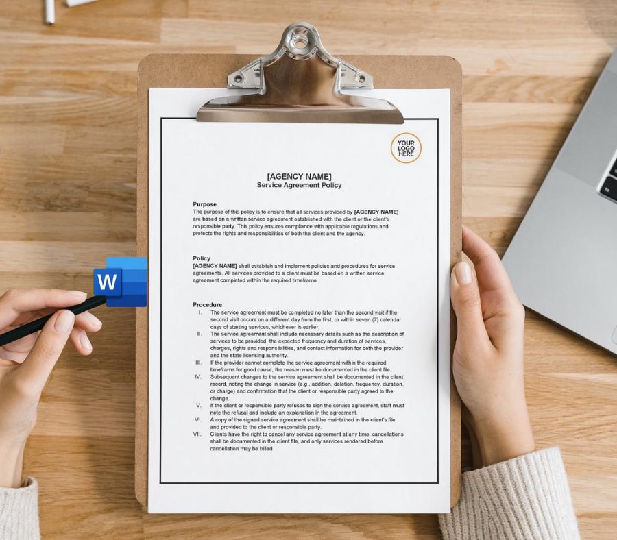 Person holding a clipboard with a service agreement policy document on a wooden desk.